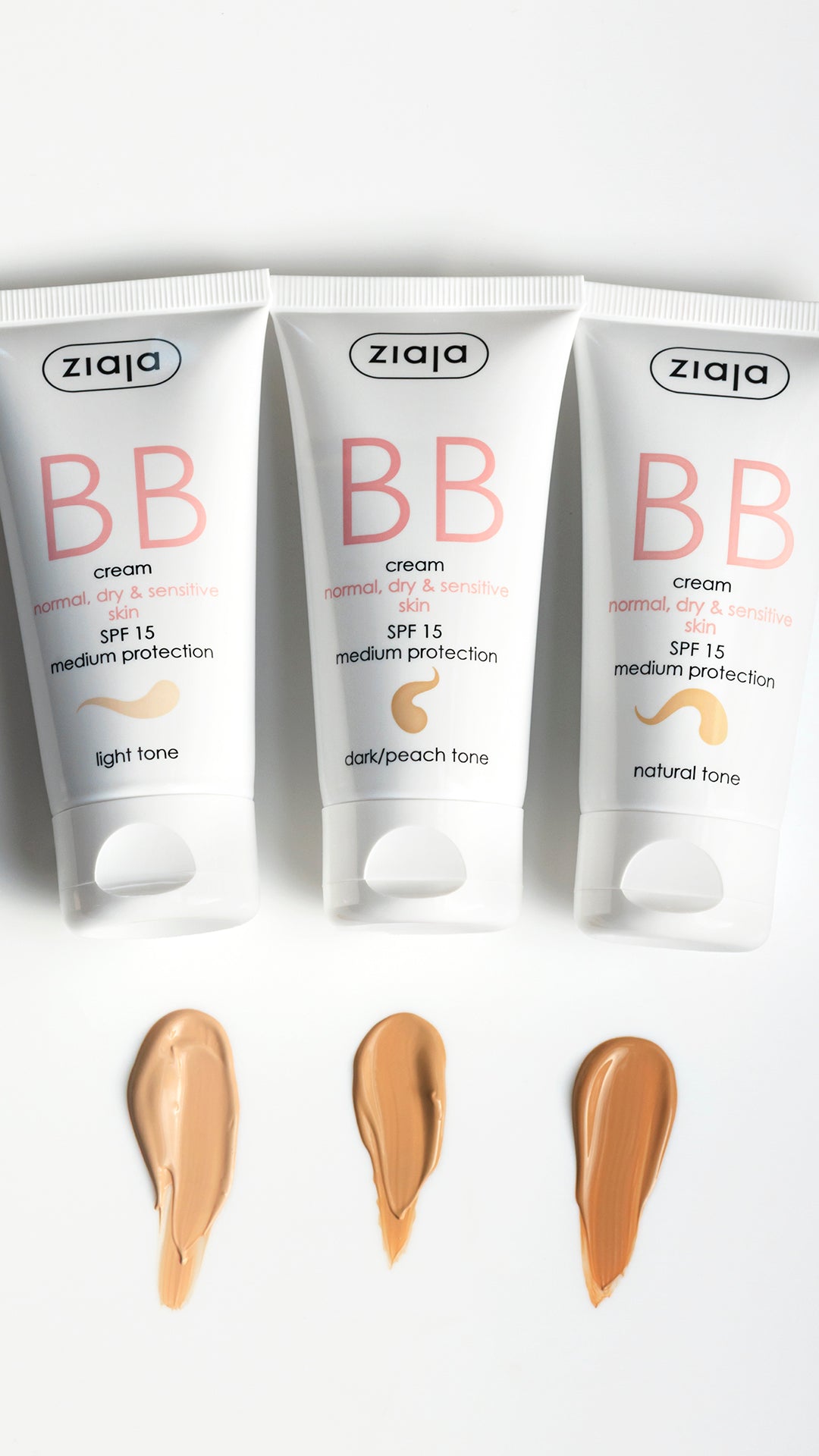 Three Ziaja BB Cream SPF 15 tubes for normal, dry and sensitive skin (light tone, dark/peach tone, natural tone) with matching shade swatches on a white background.