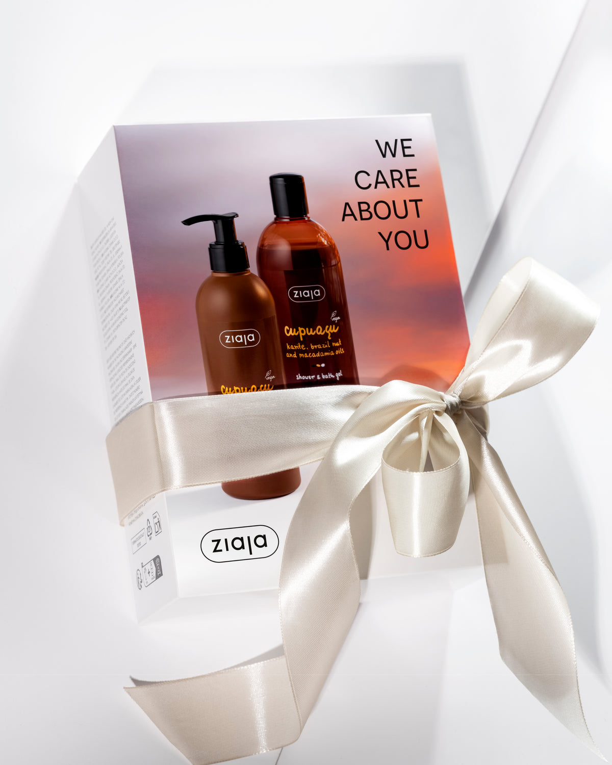 Ziaja Cupuacu vegan body care gift set with bronzing body lotion and moisturising shower and bath gel, tied with an ivory satin ribbon