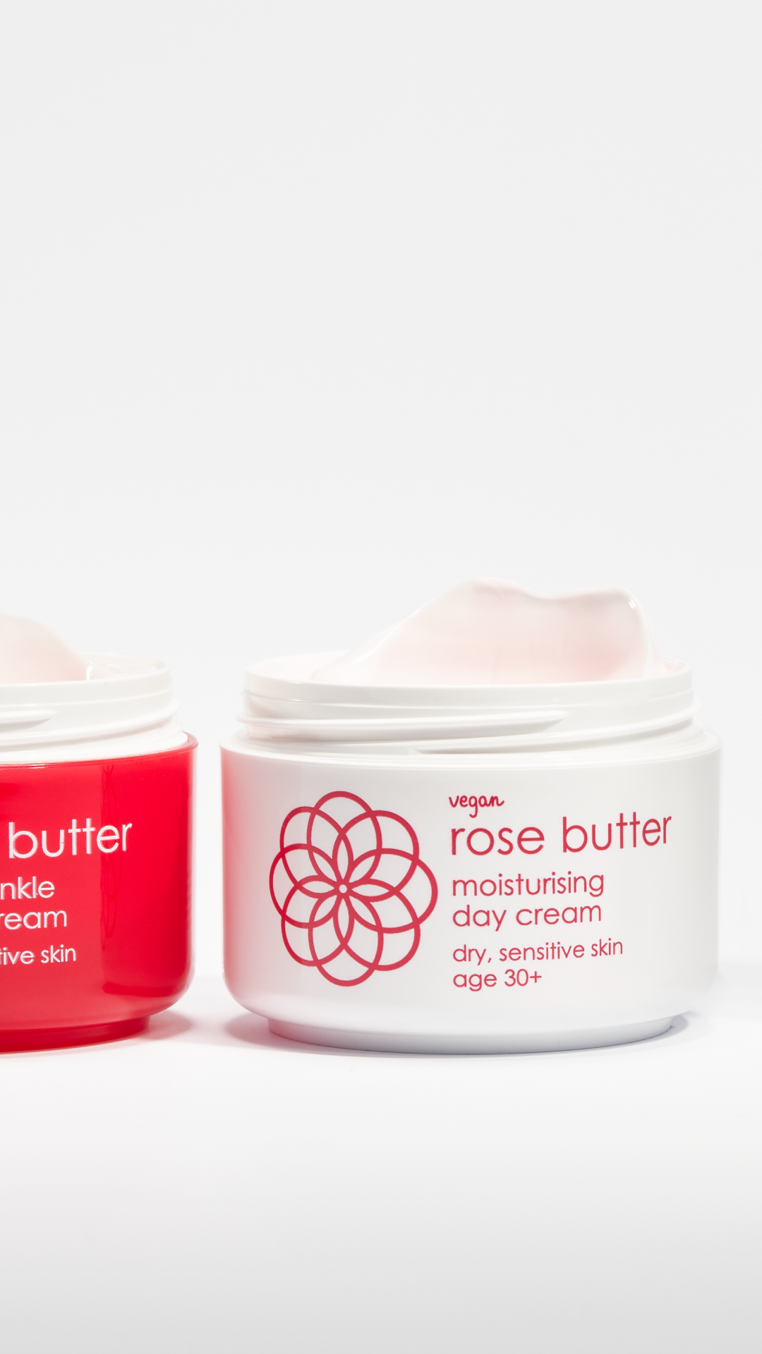 Ziaja Rose Butter moisturising day cream jar (dry, sensitive skin 30+) with lid off, next to a red Ziaja face cream jar on a white background.
