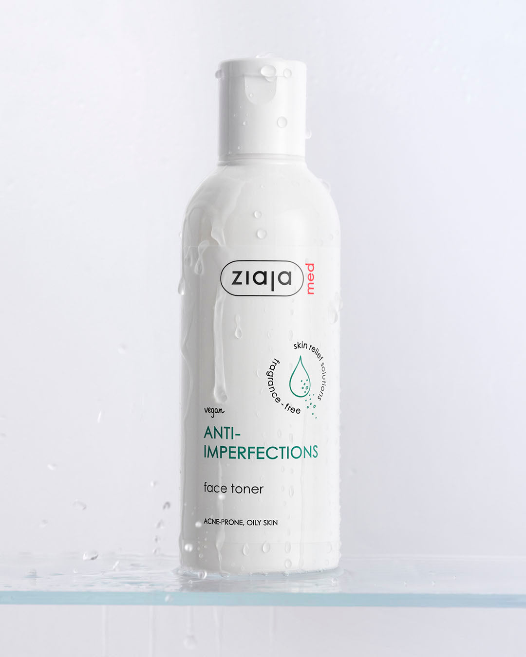Ziaja Anti-Imperfections face toner bottle on a light gray background
