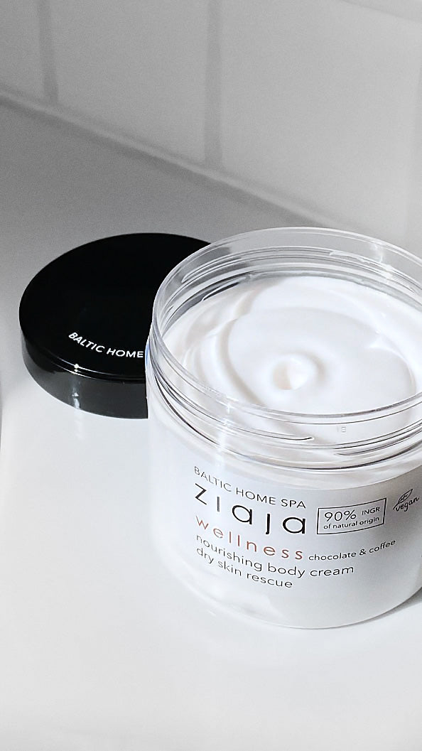Ziaja Baltic Home Spa Wellness  Body cream jar on a white tiled background