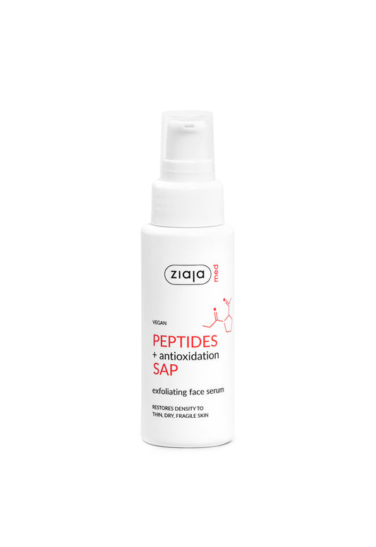 Ziaja exfoliating face serum bottle on a white background