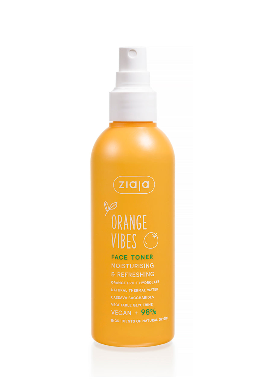 An orange spray bottle of Ziaja Orange Vibes Face Toner against a white background.