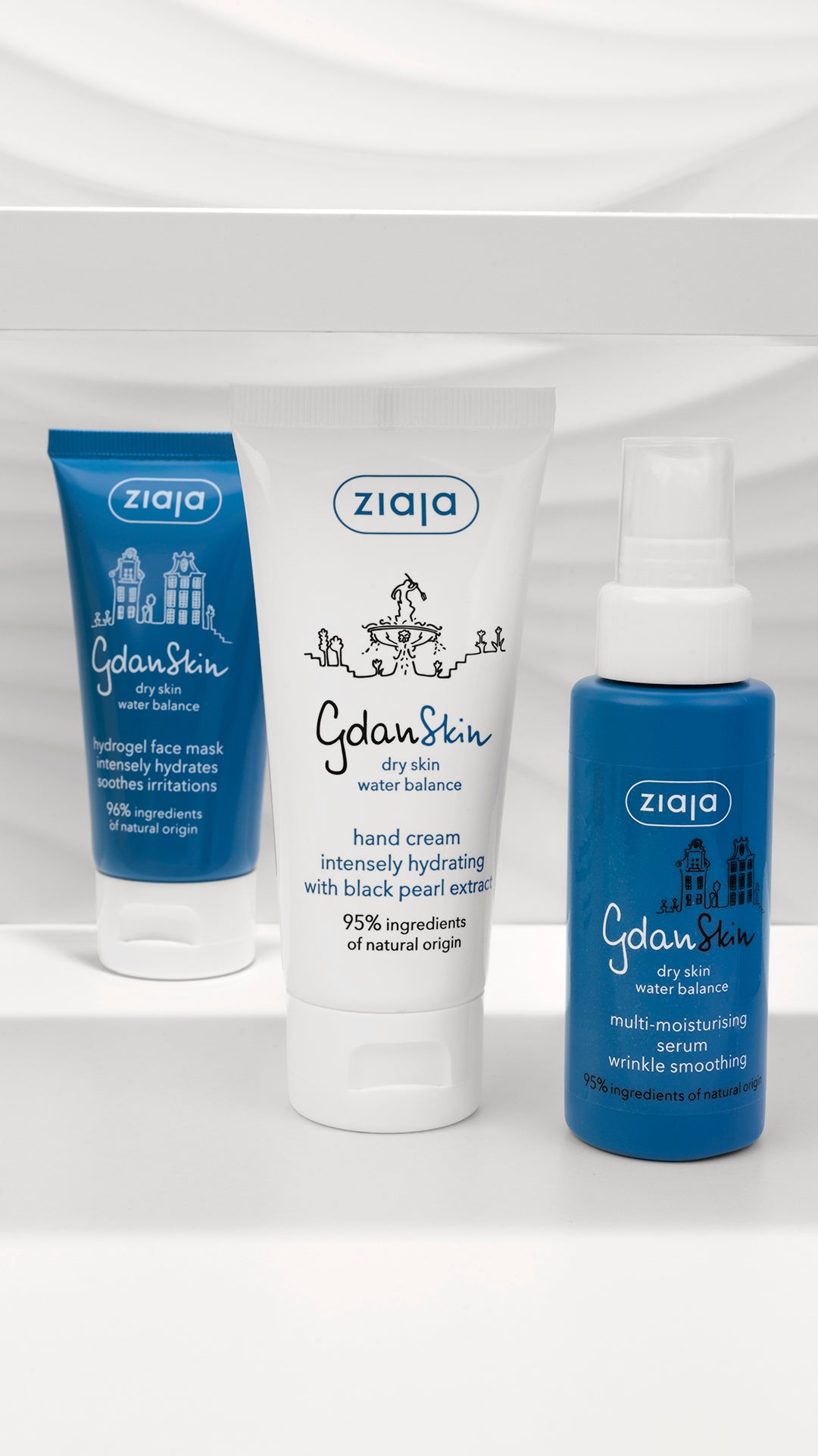 Ziaja skincare products including a face mask, hand cream, and bottle on a white background