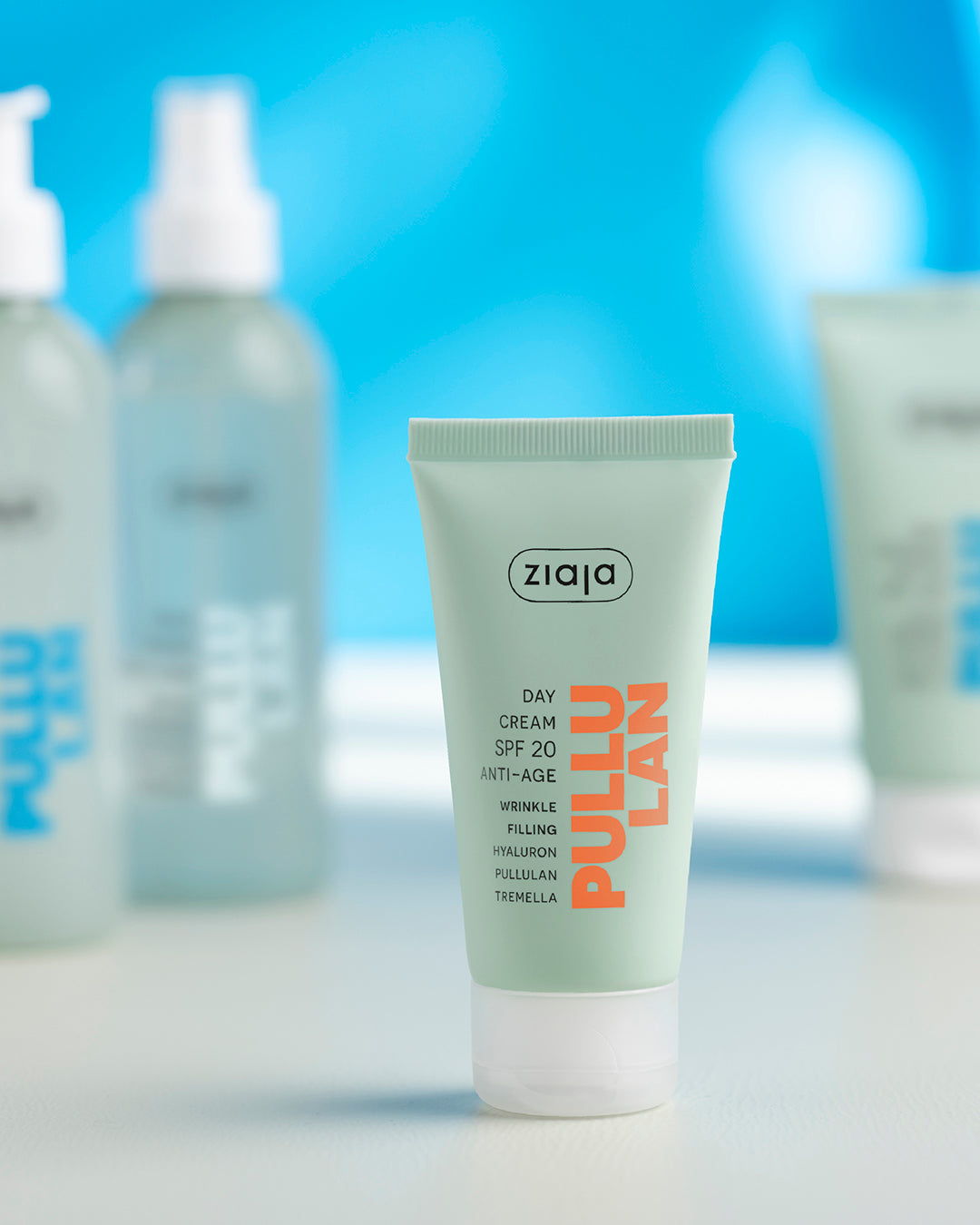 Ziaja skincare product with a blue gradient background