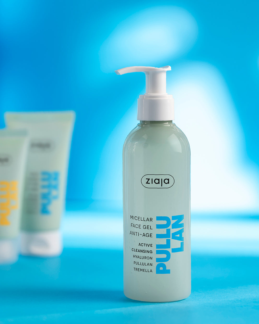 Ziaja Pullulan Face Gel bottle on a blue background
