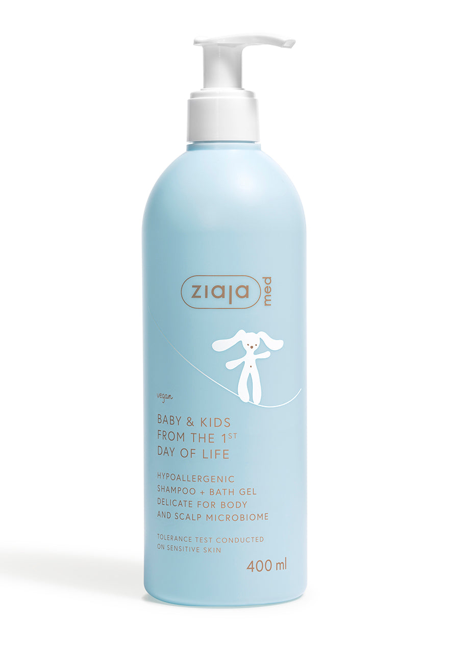 A blue bottle of Ziaja Med Baby & Kids Shampoo + Bath Gel with a pump dispenser, labeled for babies and kids from the day of life, 400 ml.