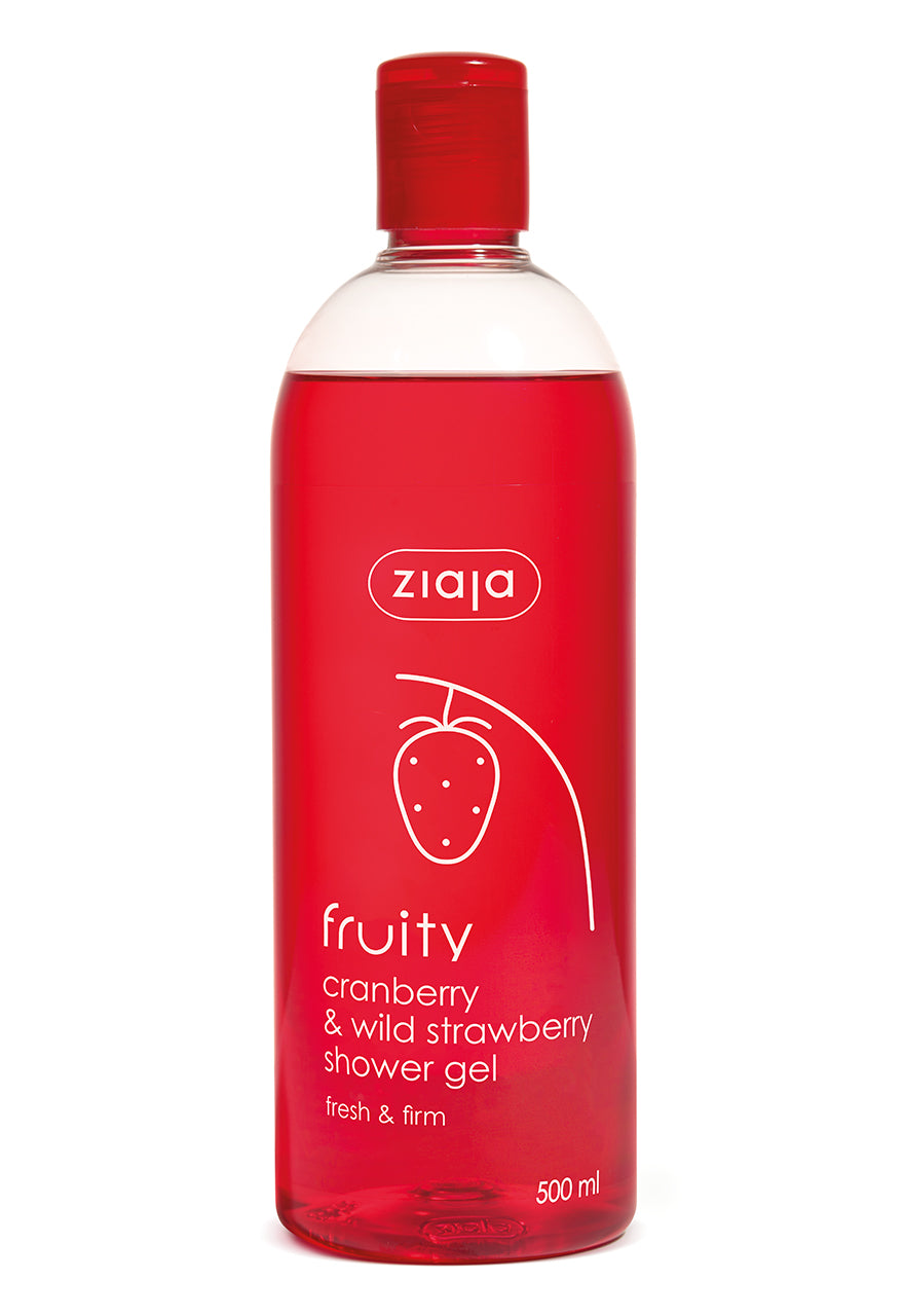A red bottle of Ziaja Fruity Cranberry & Wild Strawberry Shower Gel with a white cap and label depicting a strawberry illustration.