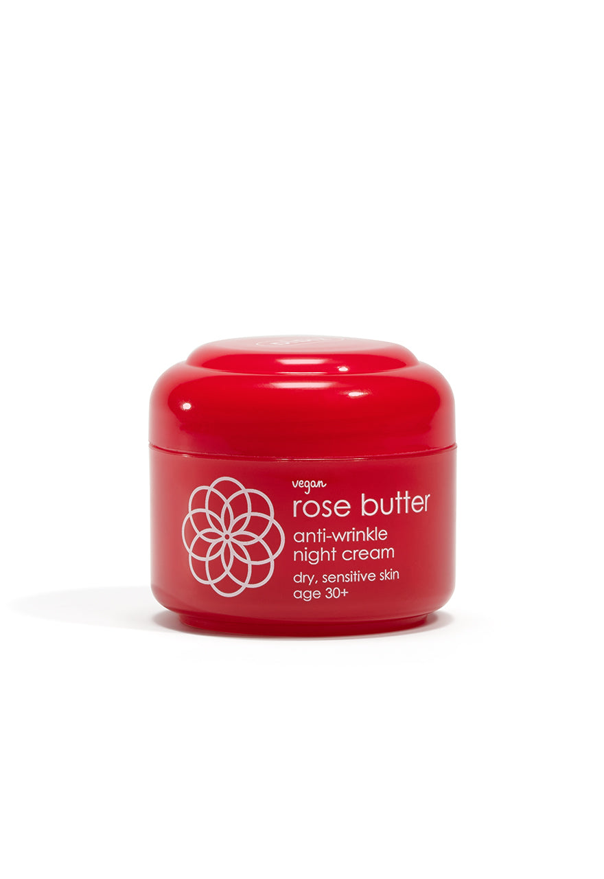 A red jar of Ziaja Rose Butter Anti-Wrinkle Night Cream with a white floral pattern and text on the label.