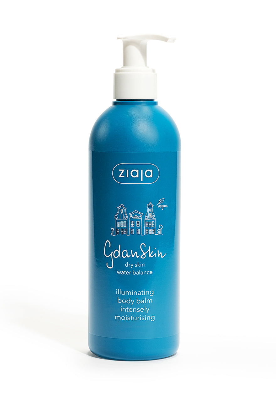 A blue bottle with a pump dispenser labeled Ziaja Gdanskin Illuminating Body Balm, with white text and graphic design.
