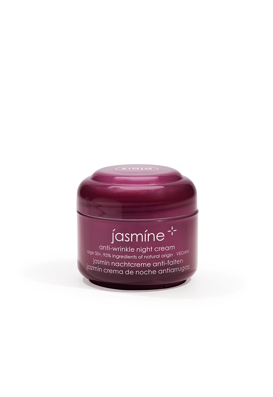 A jar of Ziaja Jasmine Anti-Wrinkle Night Cream with a purple lid and white label on a white background.