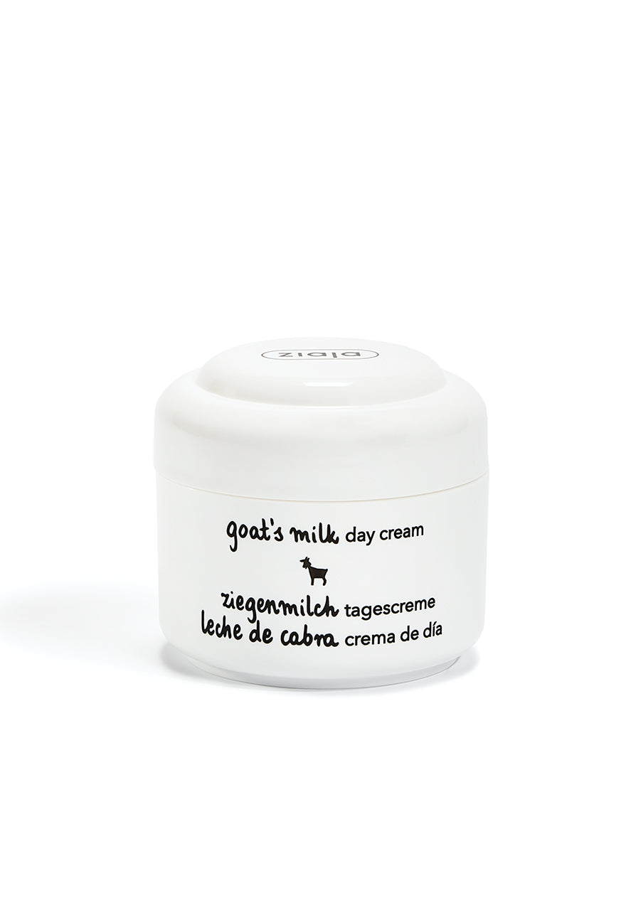 Ziaja white plastic jar of cream with black writing.