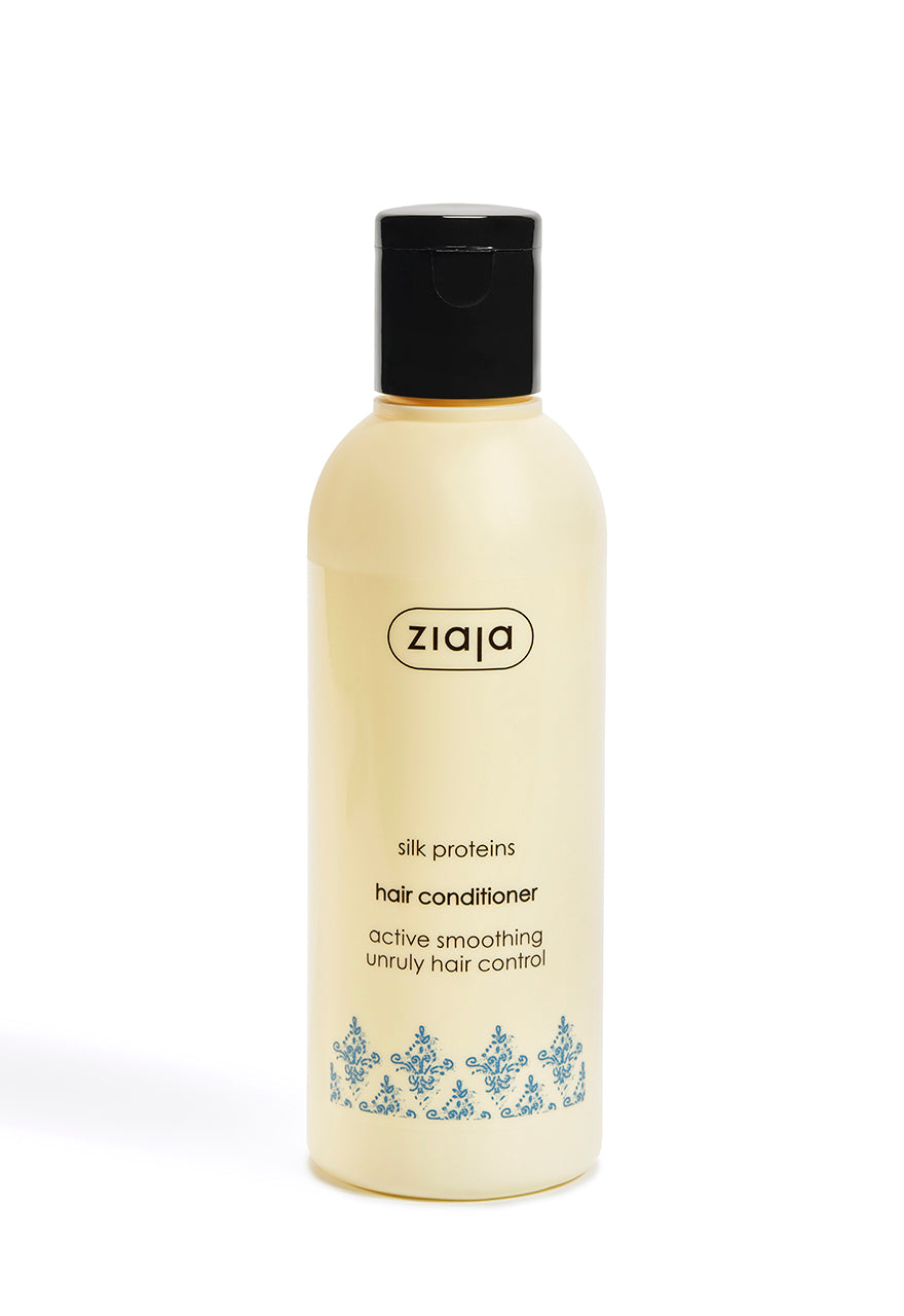 A bottle of Ziaja Silk Proteins Hair Conditioner with a capacity of 200ml. The label shows the brand name and product description.