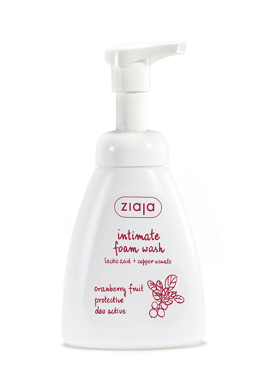A pump bottle of Ziaja Intimate Foam Wash Cranberry Fruit with product details in Polish.