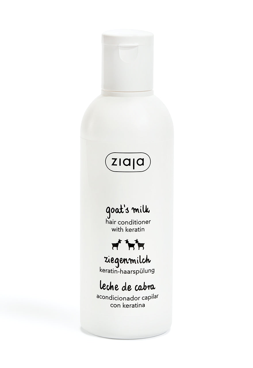 A white bottle with a pump dispenser labeled Ziaja Goats Milk Hair Conditioner 200ml.