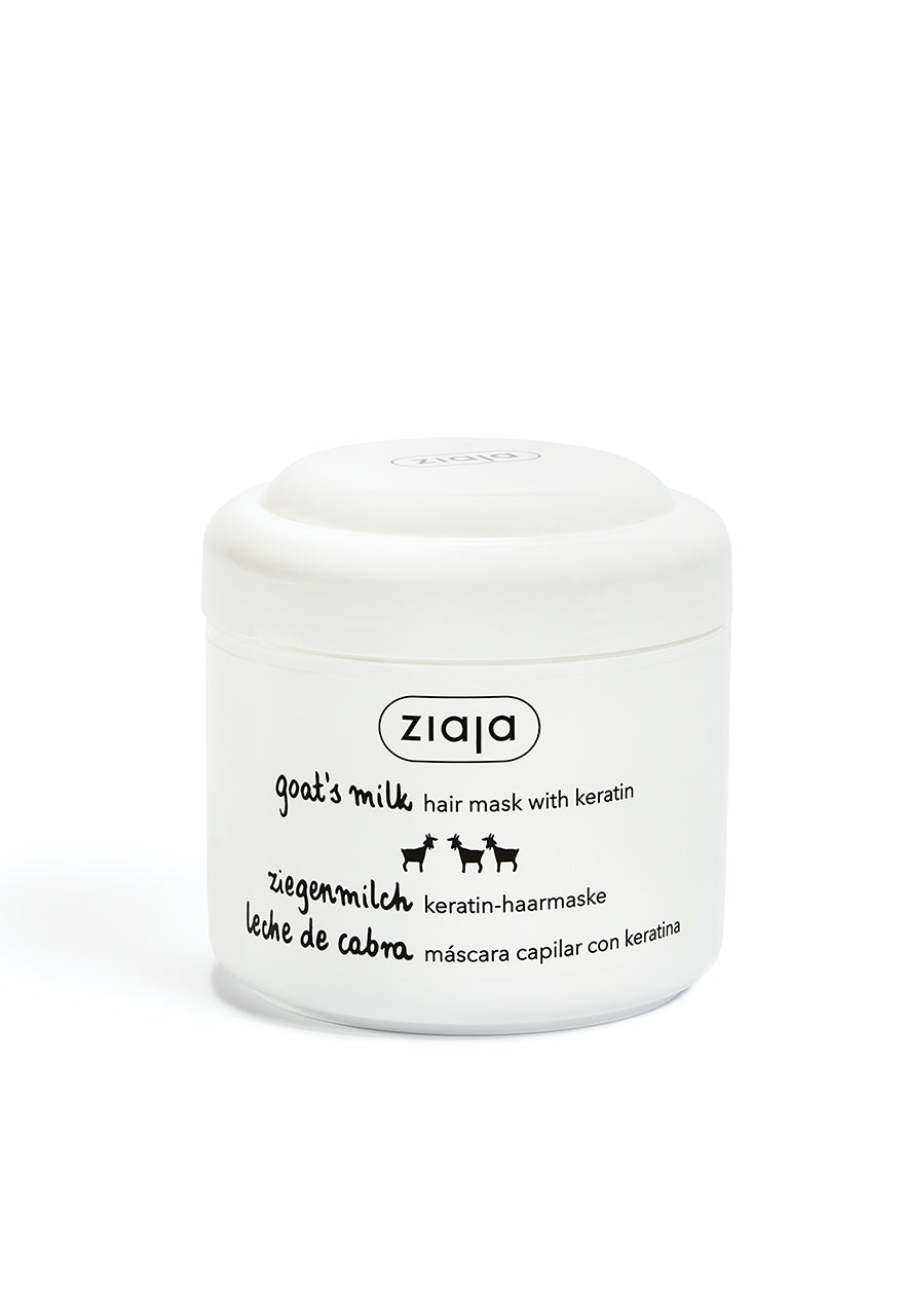 A white jar of Ziaja Goats Milk Hair Mask with black and green label, indicating it is a hair care product with goat's milk and keratin.
