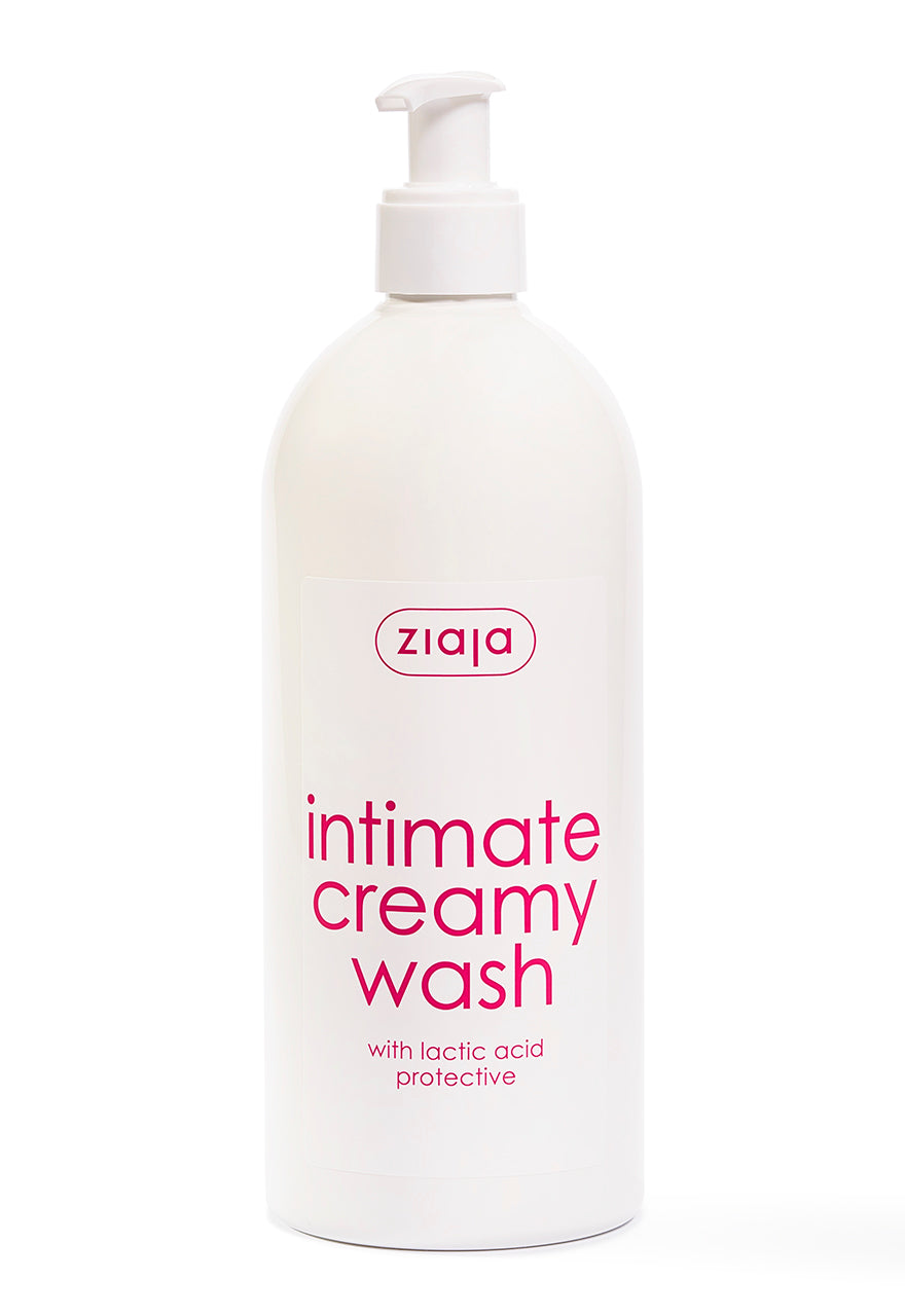 A white bottle with a pump dispenser labeled 'Ziaja Intimate Creamy Wash with Lactic Acid'.
